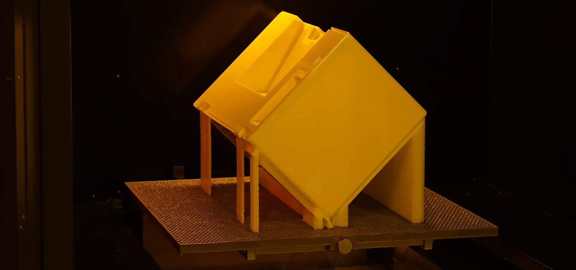 Industrial resin printer operating in a manufacturing environment