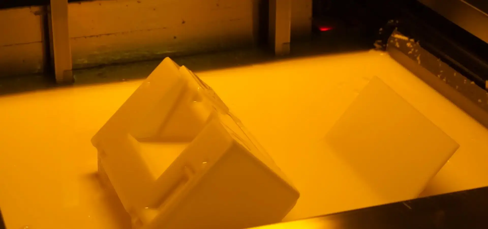 Resin printer photopolymerization process turning liquid resin into solid parts