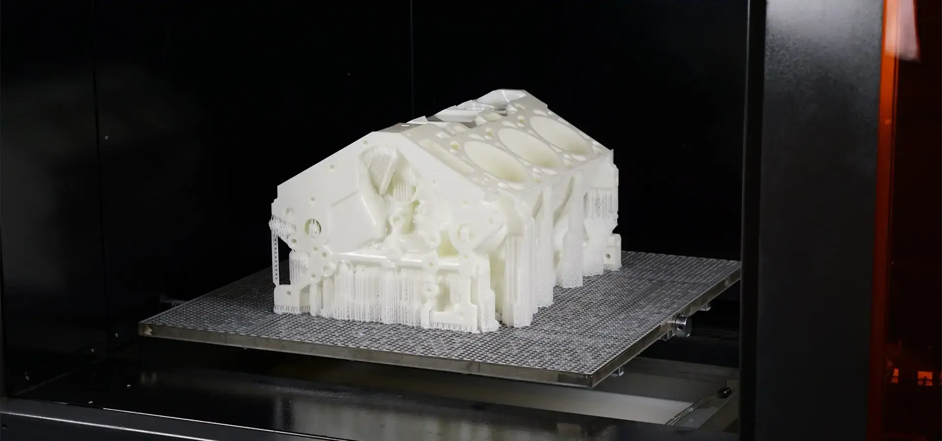 Industrial Stereolithography 3D printer with laser-based photopolymerization system curing resin inside vat