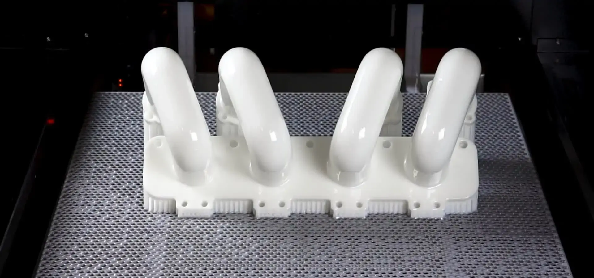 Large format SLA 3D Printer printing multiple industrial parts in a single build