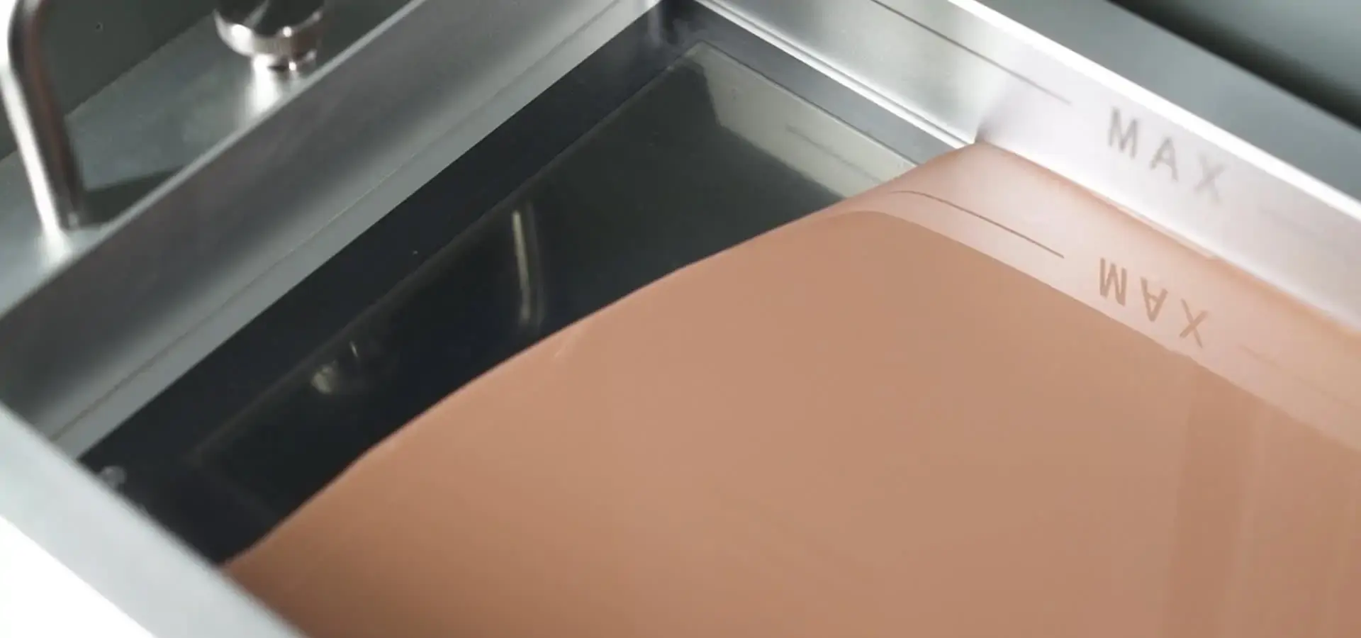 Different resin materials used in budget SLA printers including dental and engineering resins Different resin materials used in budget SLA printers including dental and engineering resins