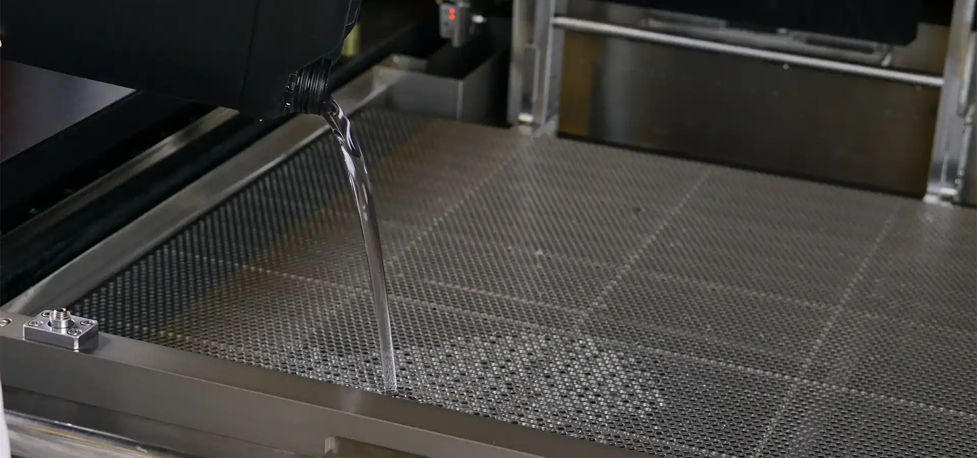 Resin tank inside SLA 3D printer used for photopolymer curing