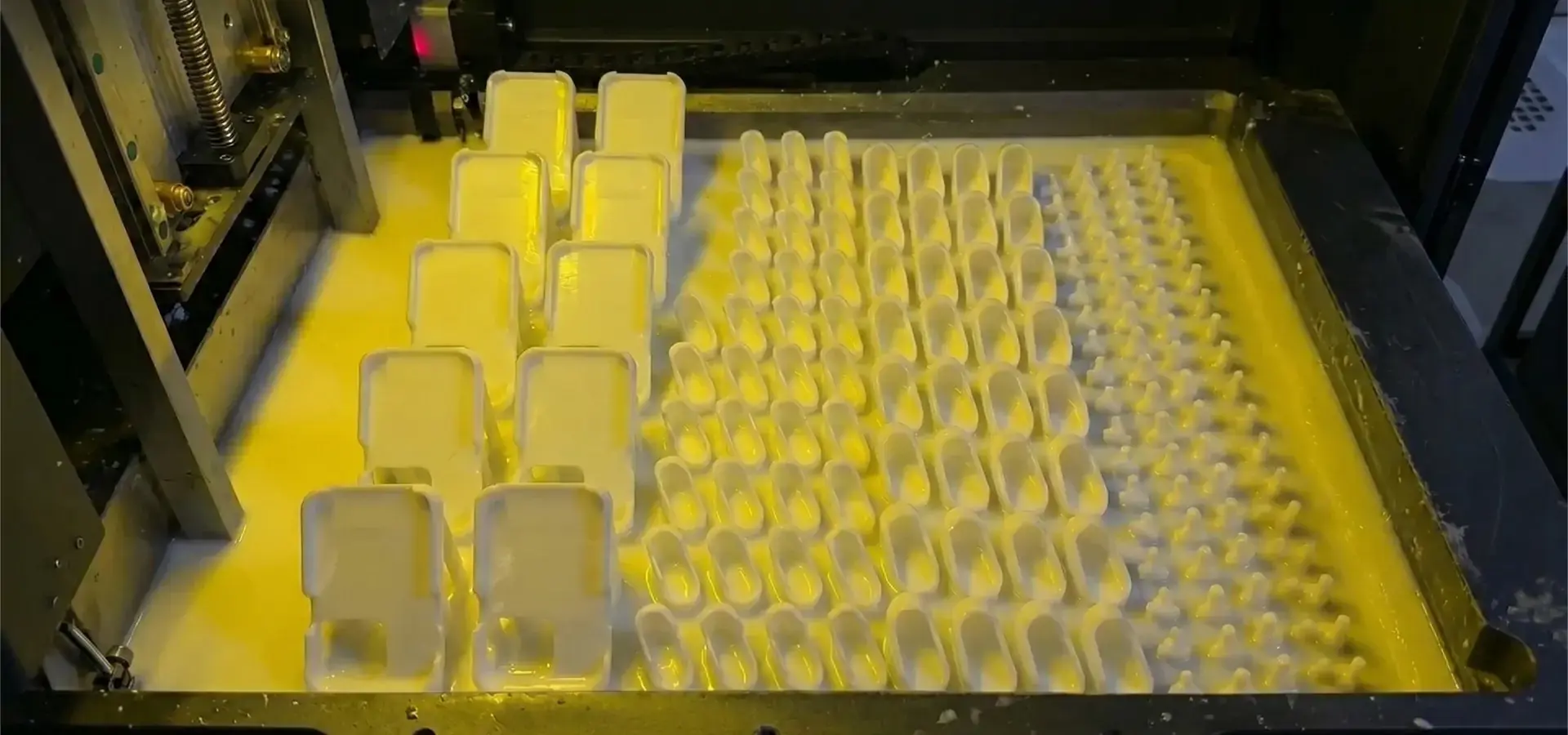 Industrial SLA 3D printer producing high-precision prototype parts Industrial SLA 3D printer producing high-precision prototype parts
