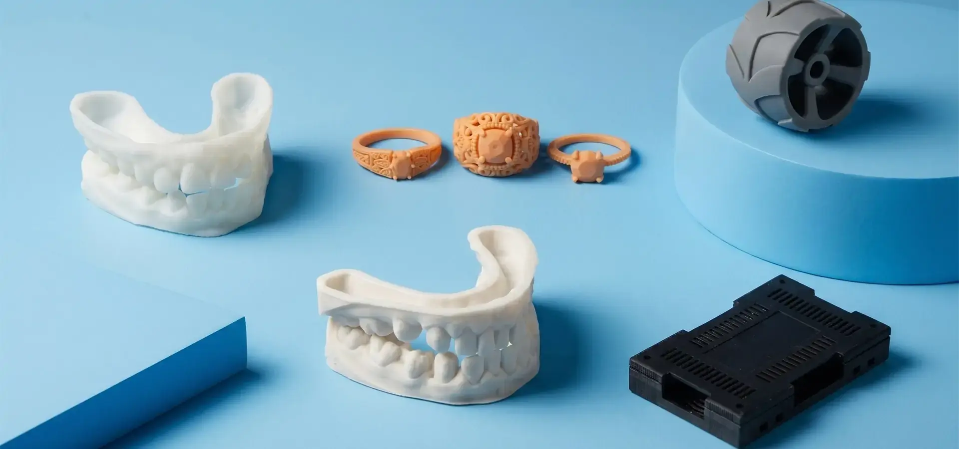 Magforms desktop SLA 3D printer lineup showing diverse engineering and dental models Magforms desktop SLA 3D printer lineup showing diverse engineering and dental models