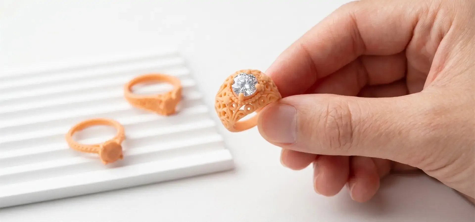 Desktop 3D printer creating high-precision resin models for jewelry casting applications Desktop 3D printer creating high-precision resin models for jewelry casting applications