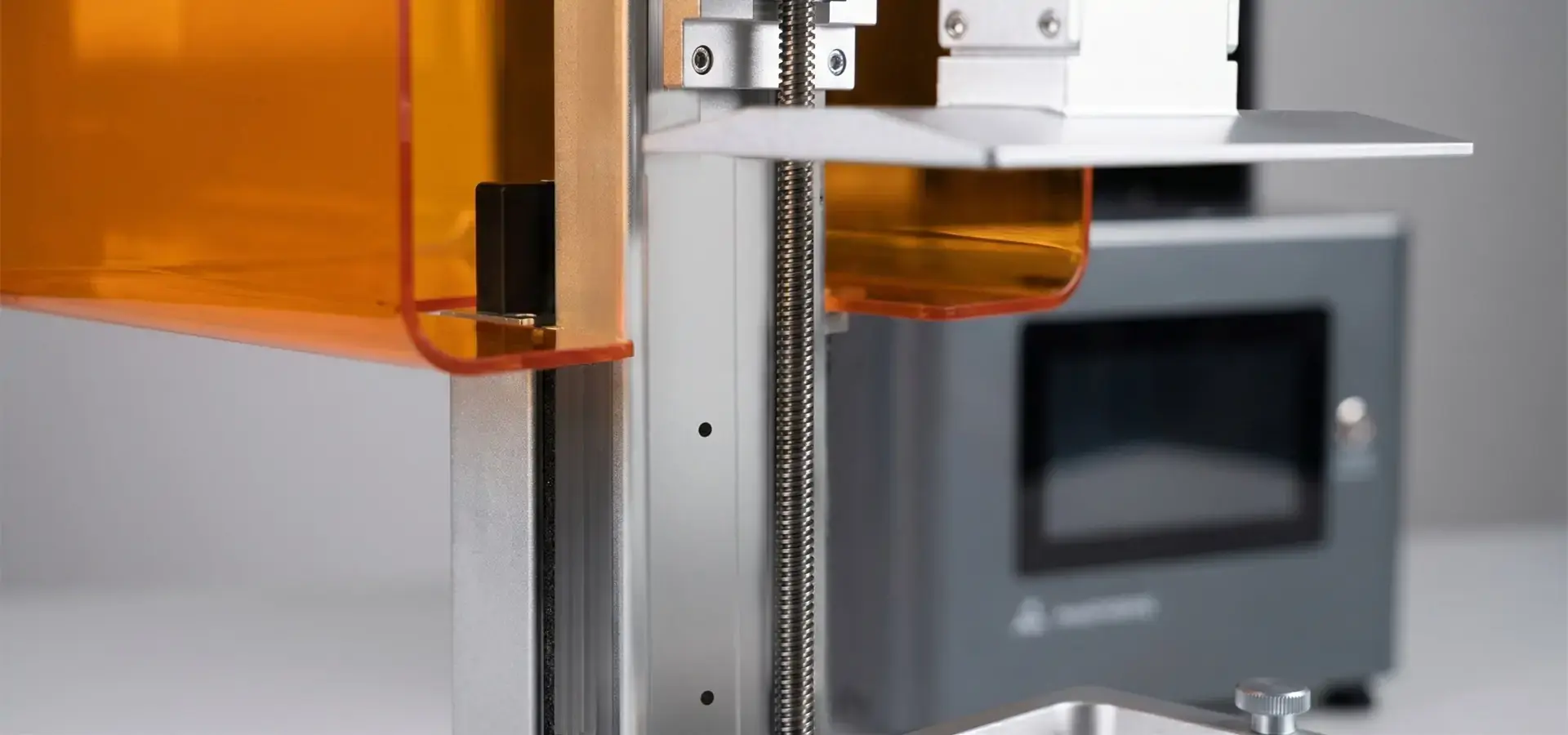 Close-up of P‑grade linear rail guiding the build platform of a Stereolithography 3D printer for micron accuracy Close-up of P‑grade linear rail guiding the build platform of a Stereolithography 3D printer for micron accuracy