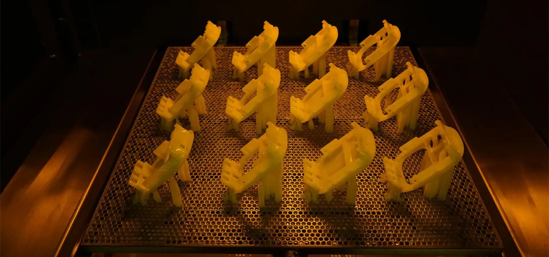 Batch production parts manufactured in a large scale resin 3D Printer demonstrating high efficiency prototyping workflow Batch production parts manufactured in a large scale resin 3D Printer demonstrating high efficiency prototyping workflow